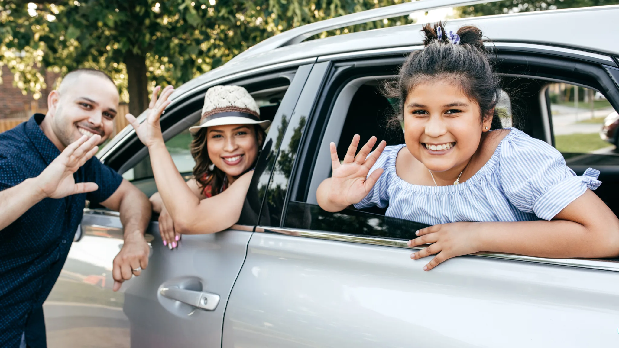 Car driving on highway at sunset
